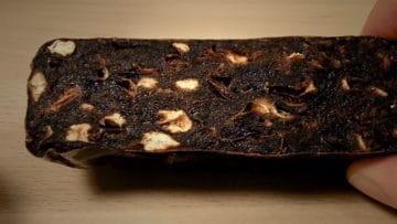 A sliced section of seedless tamarind block. Pulp exposed. | secretsofcooking.com
