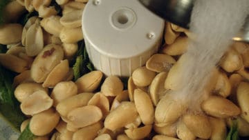 Adding salt to food processor. | secretsofcooking.com