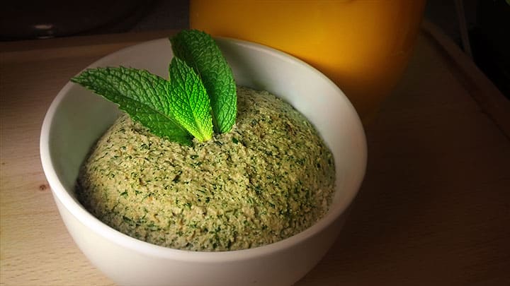 Peanut Mint Chutney in a bowl garnished with mint leaves.